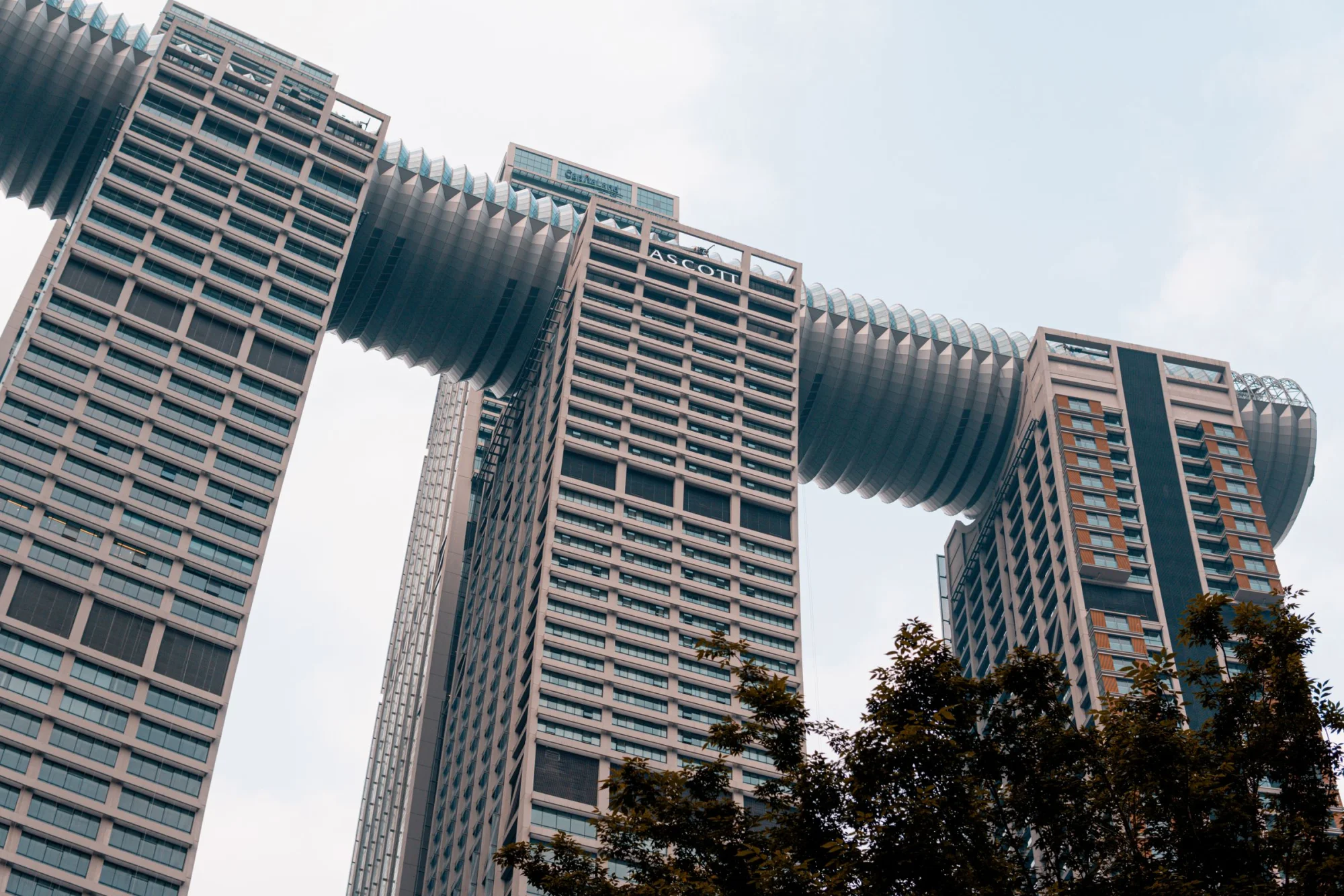 View of the futuristic architecture of Raffles City Chongqing, a prominent tourist landmark in China.