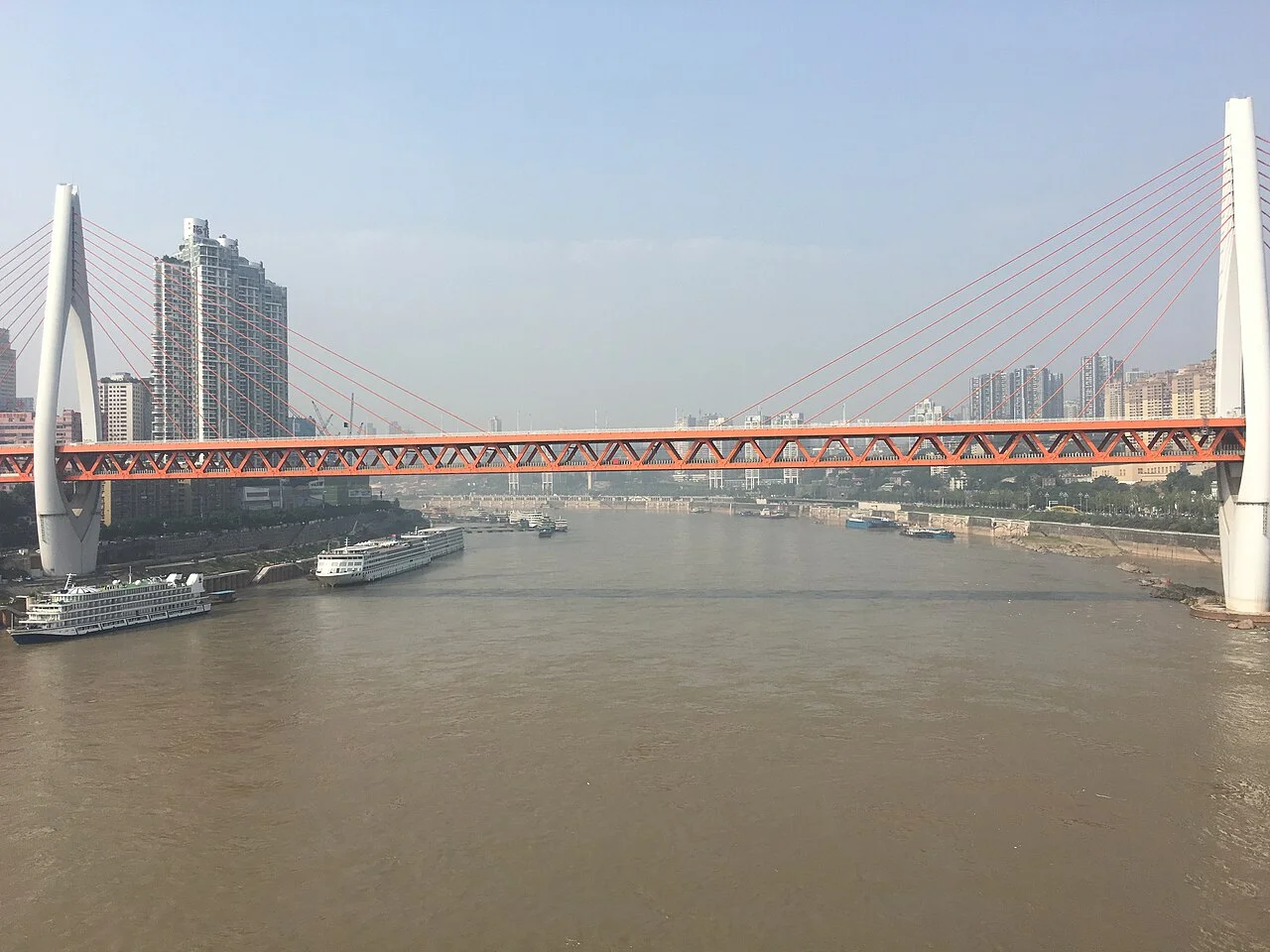 The Yangtze River and the Qiansimen Bridge from the cable car in Chongqing, China in September 2016