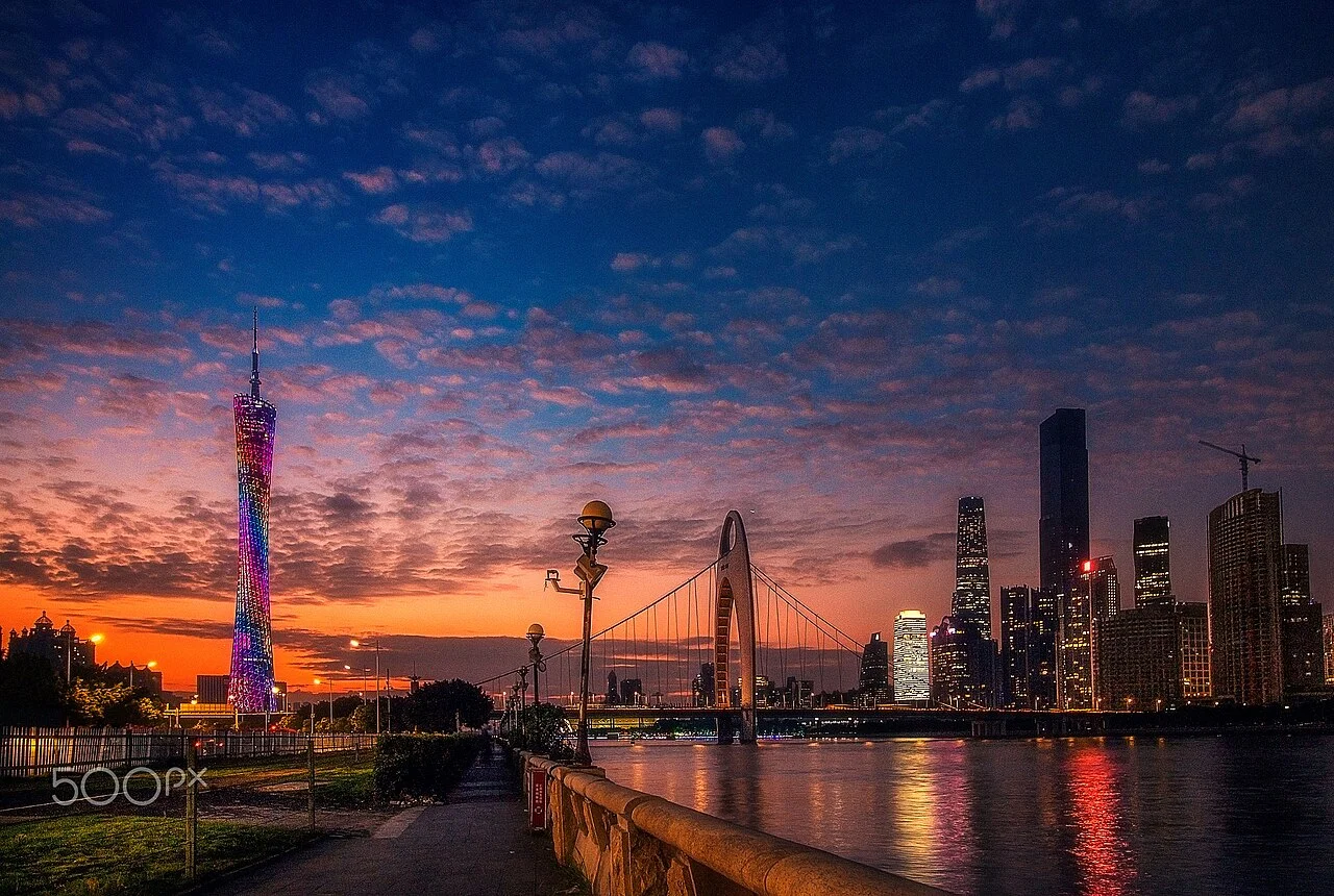 500px provided description: 20985652 Jpg [#sky ,#city ,#sunset ,#water ,#downtown ,#reflection ,#river ,#travel ,#tower ,#urban ,#architecture ,#cityscape ,#bridge ,#building ,#evening ,#skyline ,#skyscraper ,#sundown ,#dawn ,#dusk ,#no person ,#IFC ,#GUANGZHOU ,#Canton Tower ,#Zhujiang New City]