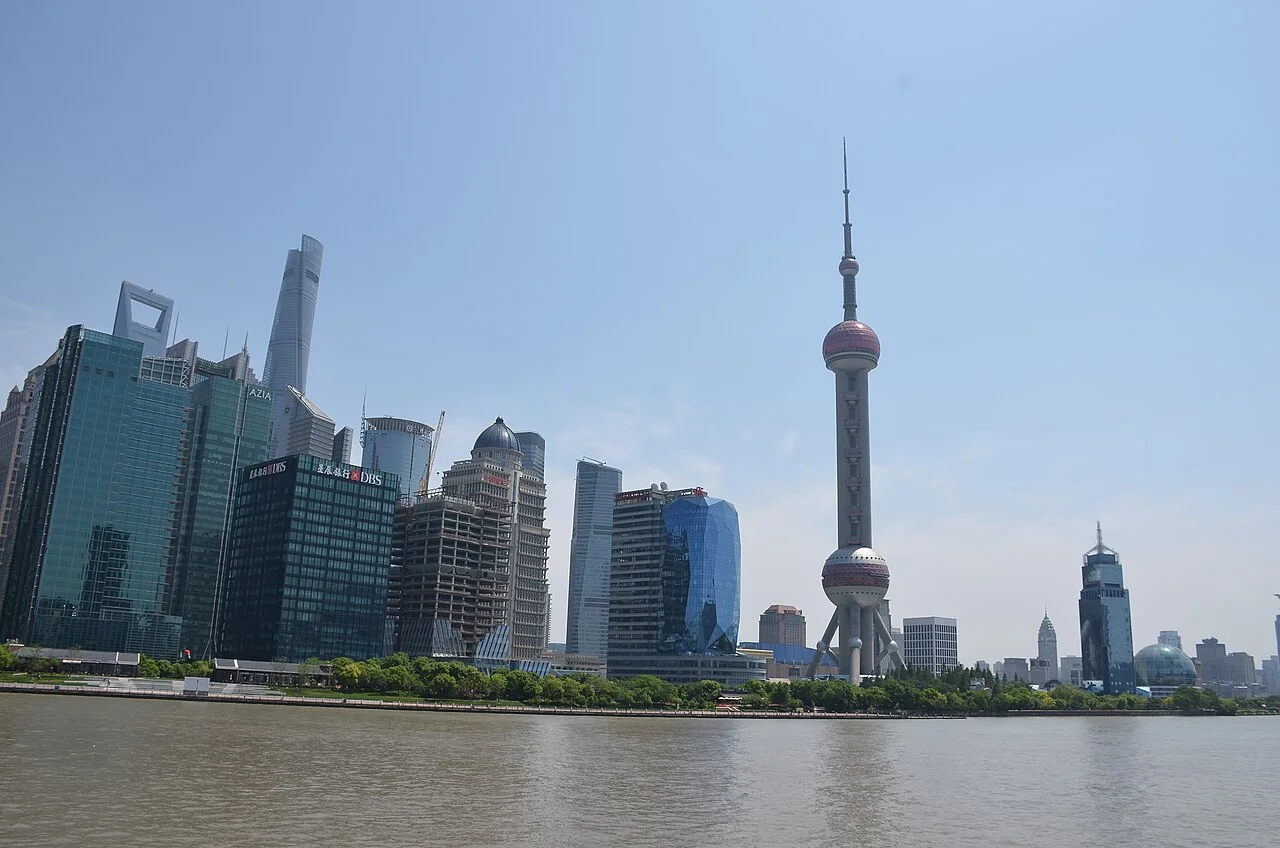 A far view of the Oriental Pearl TV Tower, which looks beautiful from any angle. Notes about the tower appeared in previous captions. Here is some additional information about the tower, which looks like a needle with an onion stuck into it. The highest sphere is called the Space Module at 350 mtr a