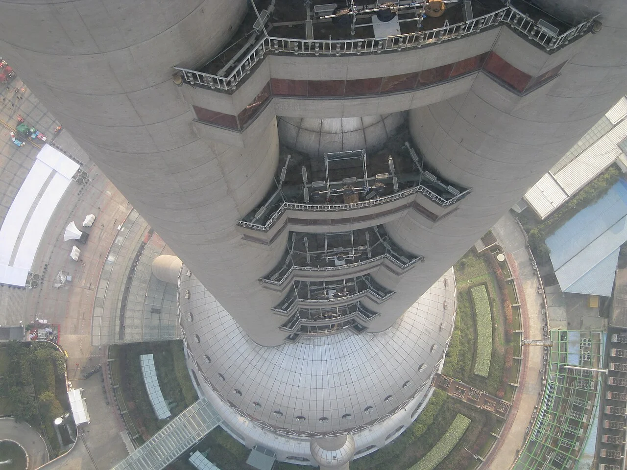 View of the Oriental Pearl Tower in Shanghai, China from the upper observation platform, which has an outside ring with a glass floor.